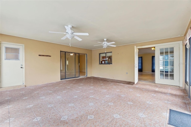 view of patio featuring ceiling fan