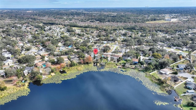 drone / aerial view with a water view