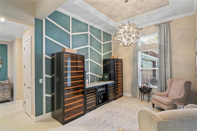 bar featuring an inviting chandelier, tile patterned floors, wine cooler, and a tray ceiling