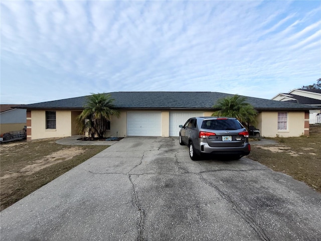 ranch-style house with a garage