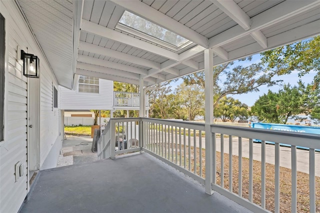 view of patio featuring a balcony