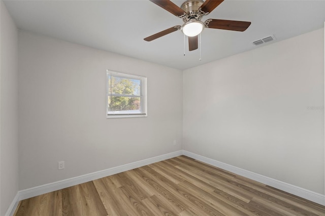 unfurnished room featuring ceiling fan and light hardwood / wood-style flooring