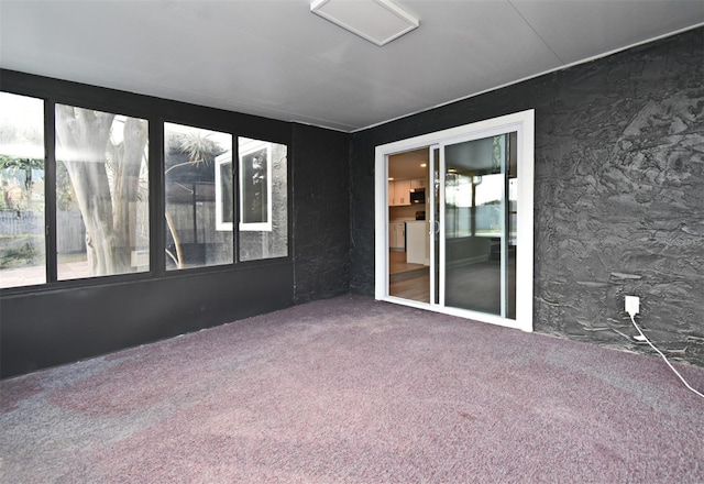 view of unfurnished sunroom