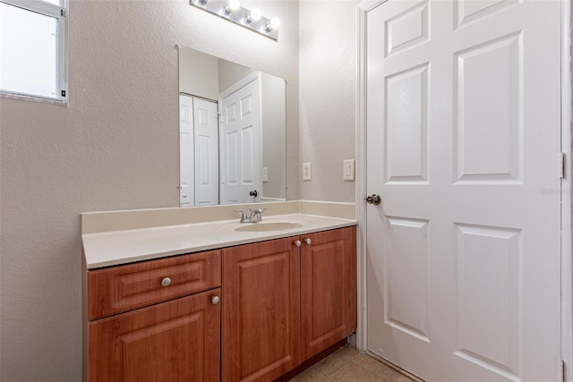 bathroom featuring vanity and tile patterned floors