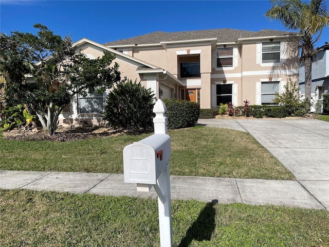 view of front facade with a front yard