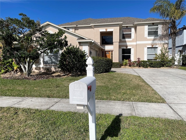 view of front of property featuring a front yard