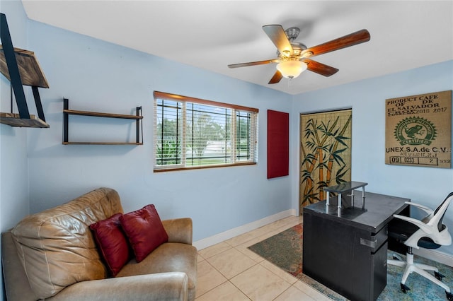 tiled office featuring ceiling fan