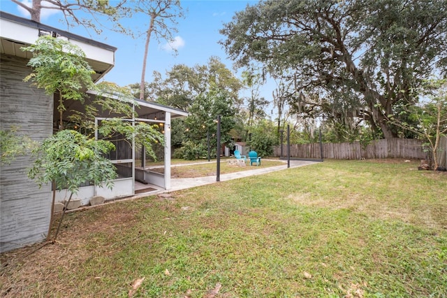 view of yard featuring a sunroom