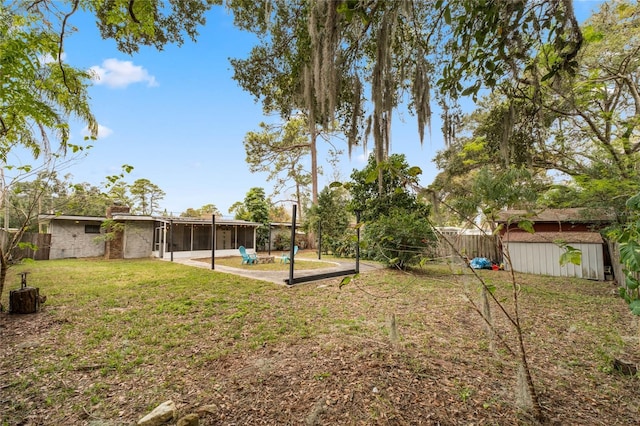 view of yard with a patio area and a shed