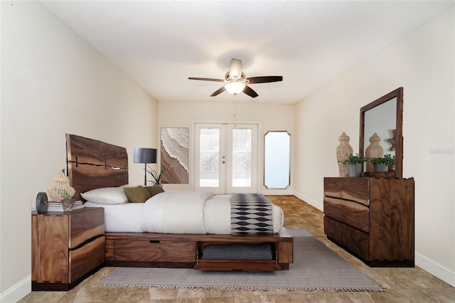 bedroom featuring ceiling fan, french doors, and a textured ceiling