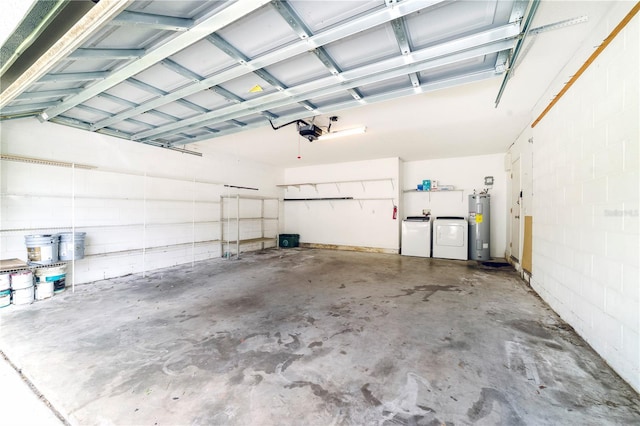 garage with water heater, a garage door opener, and washing machine and dryer