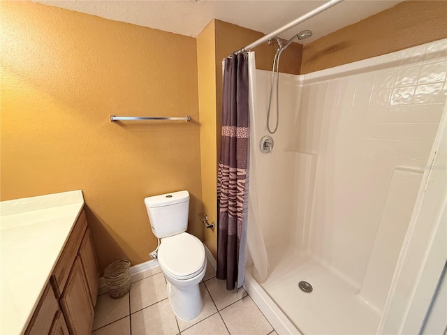 bathroom with walk in shower, tile patterned floors, toilet, and vanity