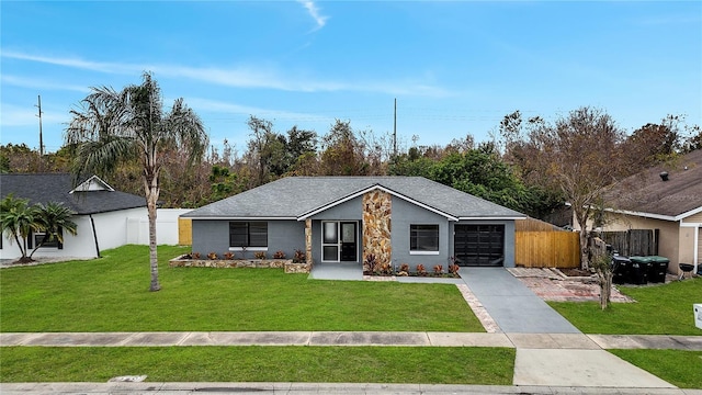 ranch-style home with a front lawn and a garage