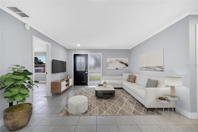 tiled living room with ornamental molding