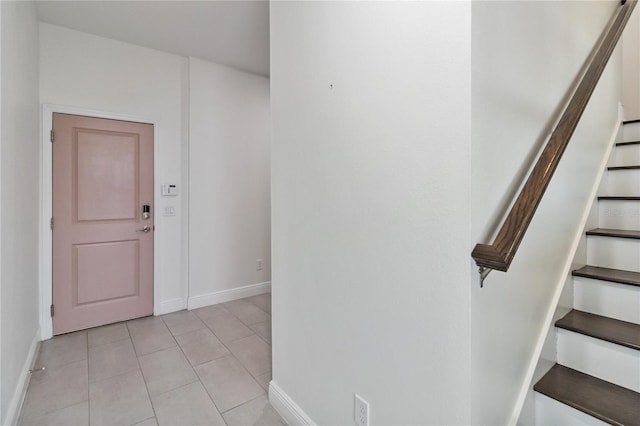 entrance foyer featuring light tile patterned floors