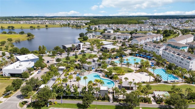 birds eye view of property featuring a water view