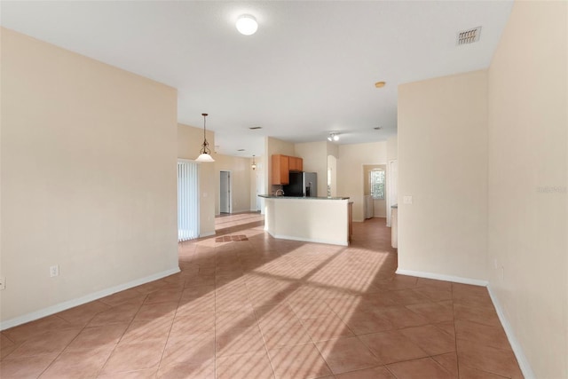 view of tiled spare room