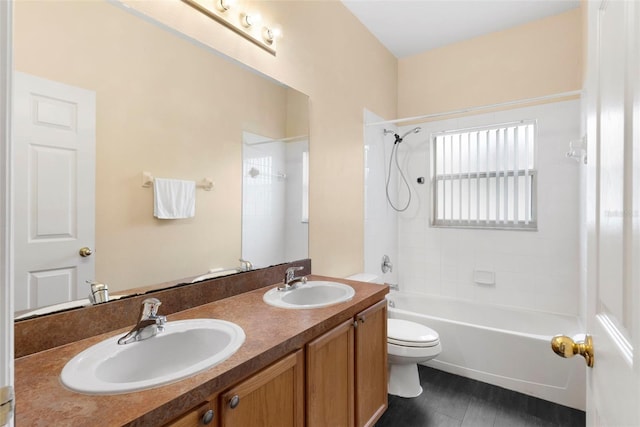 full bathroom with toilet, tiled shower / bath combo, vanity, and hardwood / wood-style floors