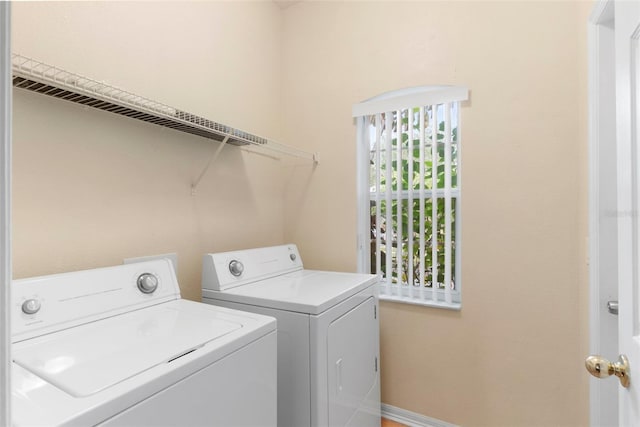 laundry area with washer and clothes dryer