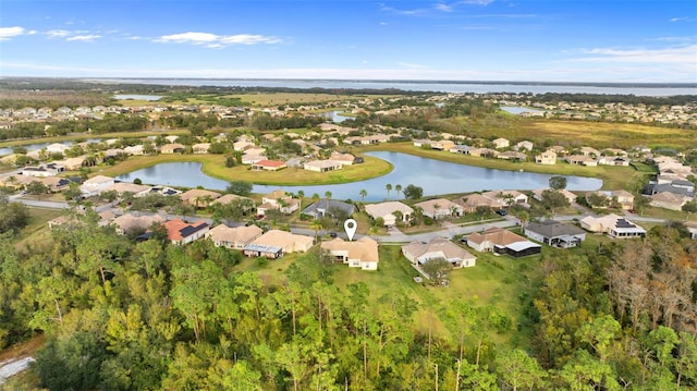 drone / aerial view with a water view