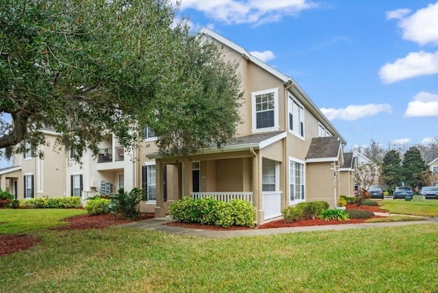 view of front of home with a front yard