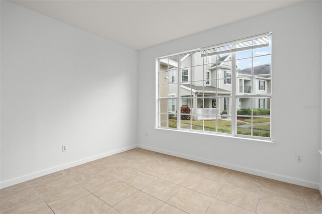 view of tiled spare room