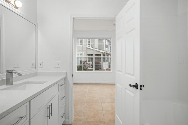 bathroom with vanity and tile patterned flooring