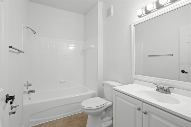 full bathroom featuring shower / bathing tub combination, vanity, tile patterned floors, and toilet