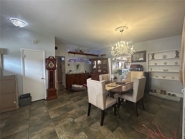 dining room featuring an inviting chandelier