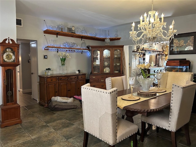 dining room featuring a notable chandelier