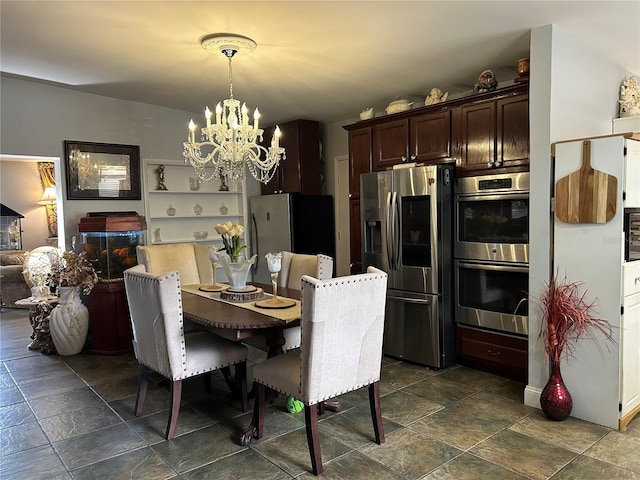 dining area featuring a chandelier