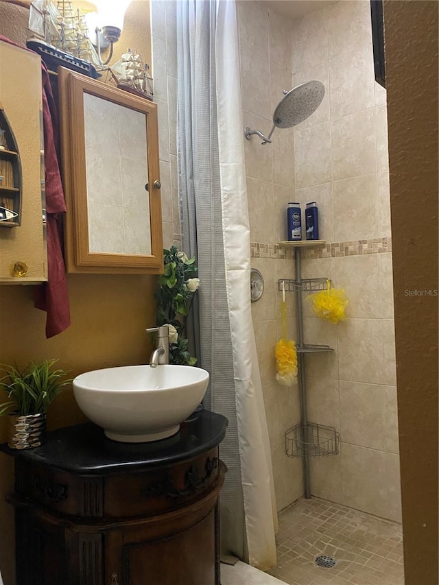 bathroom with vanity and walk in shower