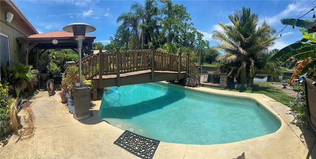 view of swimming pool with a gazebo