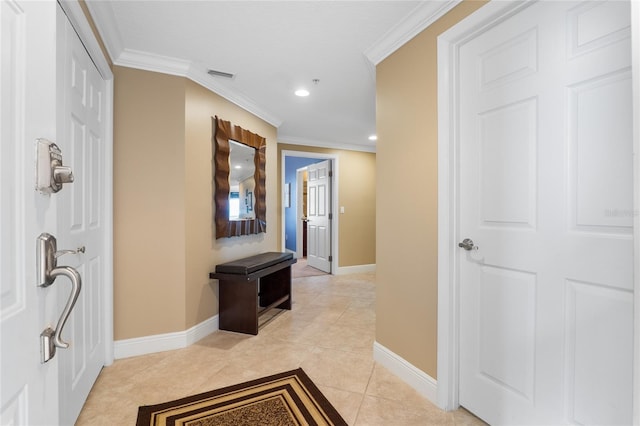 corridor featuring light tile patterned flooring and ornamental molding