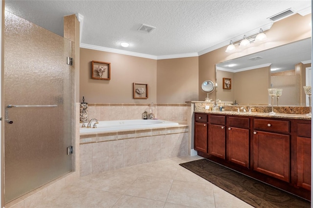 bathroom featuring vanity, tile patterned flooring, independent shower and bath, ornamental molding, and a textured ceiling