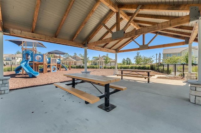 surrounding community featuring a gazebo and a playground