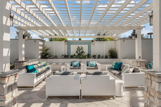 view of patio / terrace with an outdoor living space and a pergola