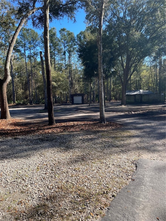 view of yard with a garage