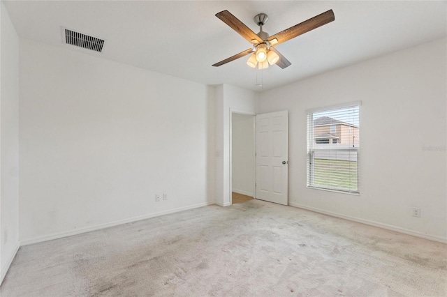 unfurnished bedroom with light carpet and ceiling fan