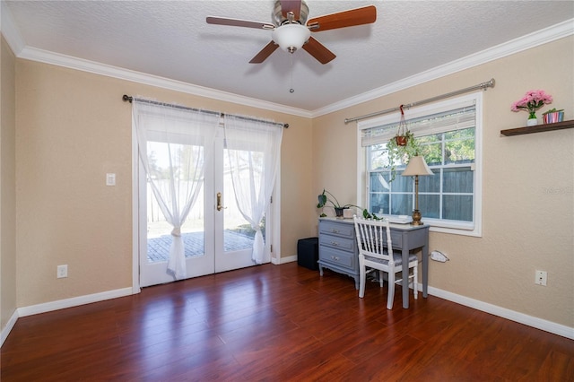 home office featuring dark wood-type flooring, ornamental molding, and french doors