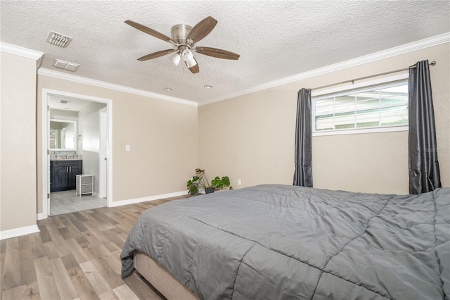 bedroom with crown molding, ceiling fan, hardwood / wood-style floors, and a textured ceiling