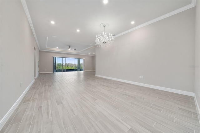 unfurnished living room featuring light wood finished floors, baseboards, and ornamental molding