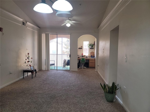 12216 Wild Iris Way Unit 112, Orlando, FL 32837 - interior space with carpet floors, lofted ceiling, baseboards, arched walkways, and ceiling fan