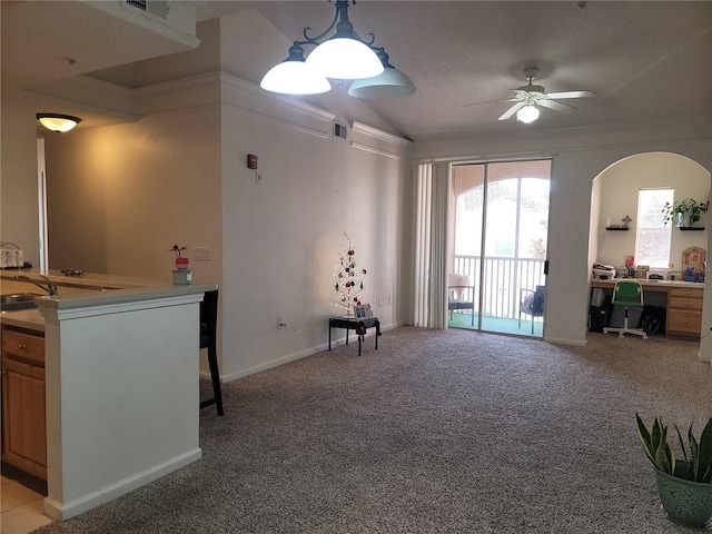 12216 Wild Iris Way Unit 112, Orlando, FL 32837 - interior space featuring lofted ceiling, light colored carpet, baseboards, a sink, and ceiling fan