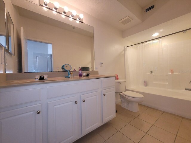 12216 Wild Iris Way Unit 112, Orlando, FL 32837 - full bath with tile patterned floors, vanity, toilet, and visible vents