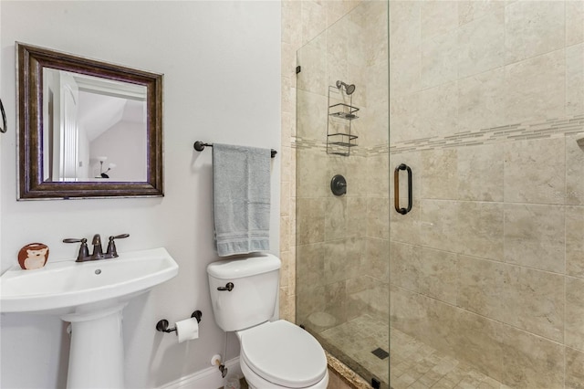 bathroom with toilet and walk in shower