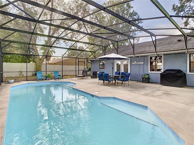 view of pool featuring a patio, a lanai, and outdoor lounge area