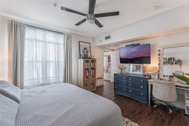 bedroom with ceiling fan and dark wood-type flooring