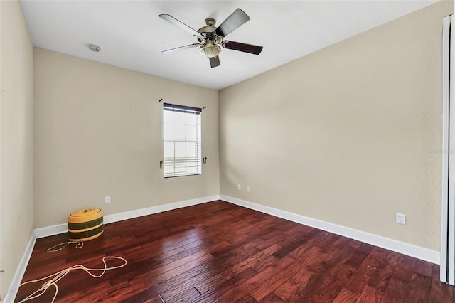 spare room featuring ceiling fan and hardwood / wood-style flooring