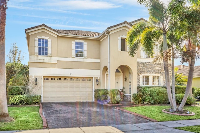 mediterranean / spanish-style home featuring a garage